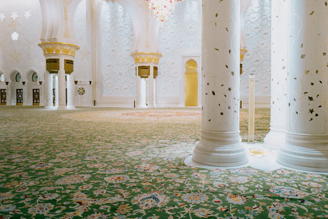 Explore the intricate design of the Sheikh Zayed Grand Mosque's prayer hall in Abu Dhabi.